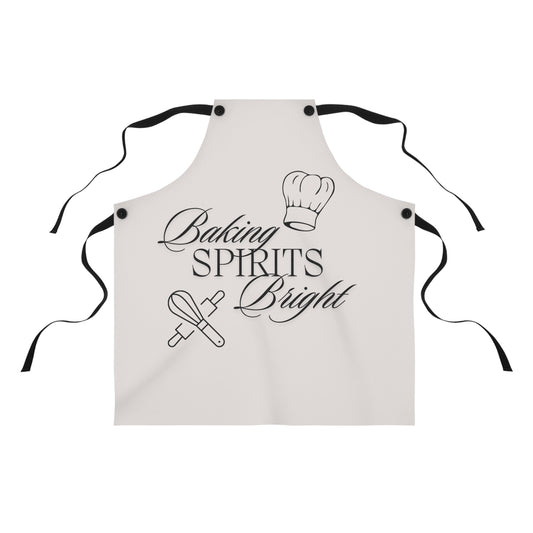 A white poly twill apron with black detachable twill straps and text 'BAKING SPIRITS BRIGHT' printed on the front.